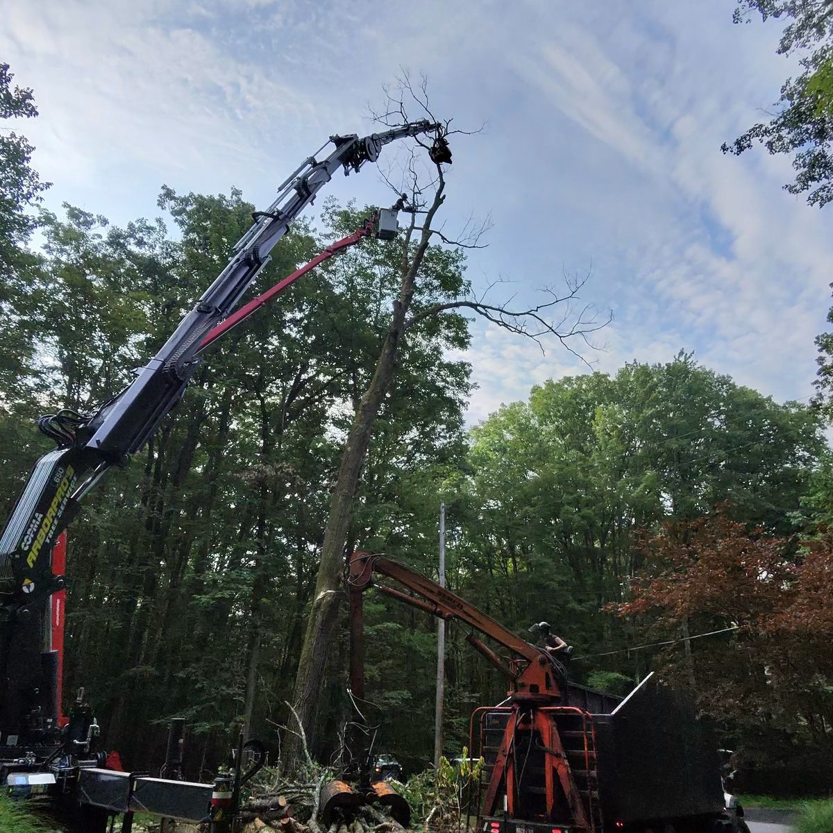 Crane truck parked in a driveway
